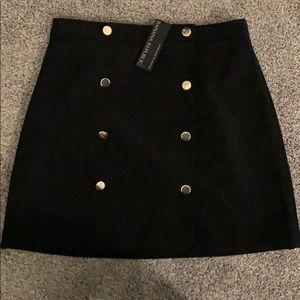 Black mini skirt with buttons